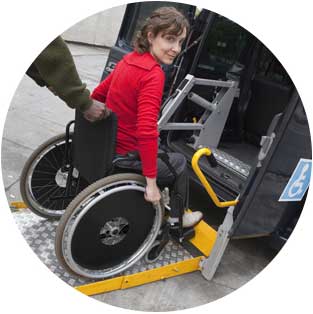 client on lift in handicapped accessible van